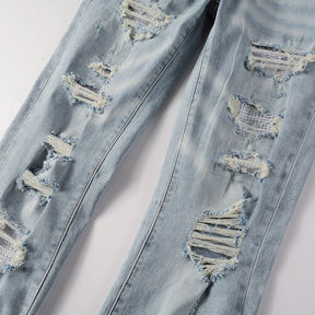 Amiri Hellblaue Patchwork Jeans für Herren – Distressed Luxus Slim Fit Denim
