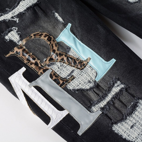 Amiri Logo Distressed Schwarze Jeans – Stylische Designer Denim für Herren