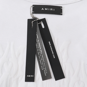 Amiri Asymmetrisches Logo T-Shirt Baumwolle Schwarz Luxus Streetwear Herren