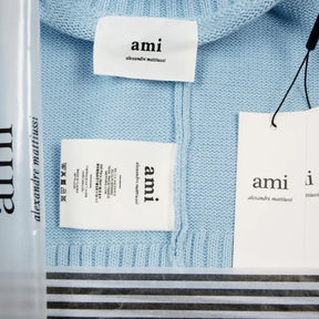 AMI Paris Unisex Merinowolle Strickpullover mit Herz-Logo – Luxuriöser Komfort und Stil