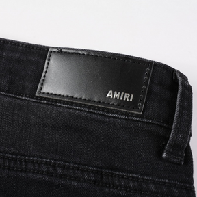 Amiri Luxus Denim Jeans: Auffällige Patches, Risse, Slim Fit Designer Stil
