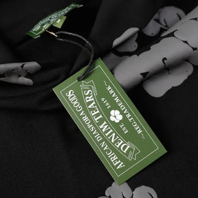 Denim Tears Schwarz-Grauer Tracksuit: Stilvoller Afrozentrischer Athleisure Anzug Herren
