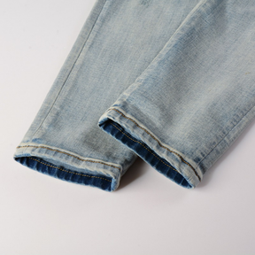 Amiri Fire Snake Jeans: Luxuriöse Designer-Denim mit feuriger Schlangenstickerei