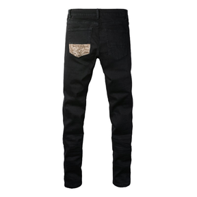 Amiri Luxus Schwarze Camouflage Jeans für Männer – Stylisch, Robust & Exklusiv