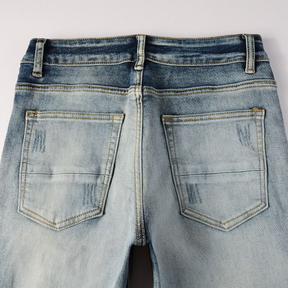 Amiri Blaue Patch Jeans Luxus Designer Denim Slim Fit Destroyed Look