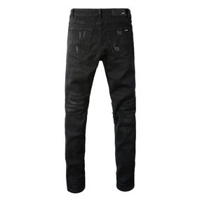 Amiri Camouflage Patch Jeans: Luxuriöse Designer Denim im Rock'n'Roll Stil