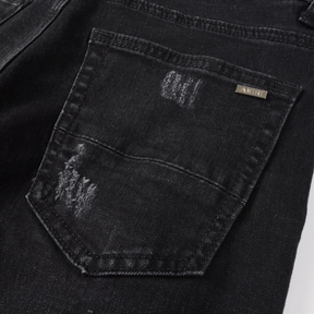 Luxuriöse Amiri Paint Splatter Jeans für Herren – Distressed Streetwear Denim