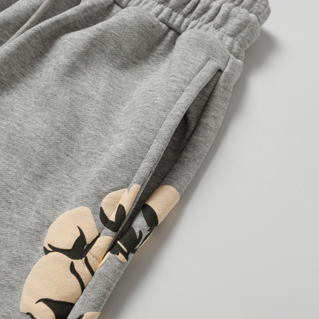 Denim Tears Kaktus Grau Trainingsanzug – Hochwertiger Baumwoll-Mix, Stilvoller Komfort, Einzigartiges Design