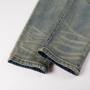 Amiri Patch-Effekt Blue Jeans: Luxuriöse Designer Denim mit Rock'n'Roll Flair