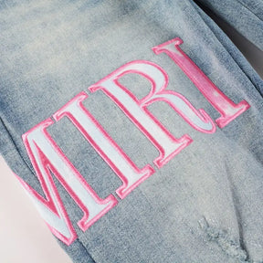 Luxuriöse Amiri Herren Designer Used-Look Jeans mit Logo und Destroyed Effekten