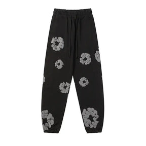 Denim Tears Schwarz-Grauer Tracksuit: Stilvoller Afrozentrischer Athleisure Anzug Herren