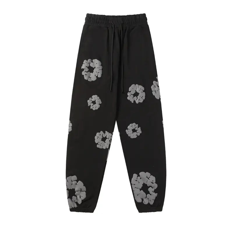 Denim Tears Schwarz-Grauer Tracksuit: Stilvoller Afrozentrischer Athleisure Anzug Herren
