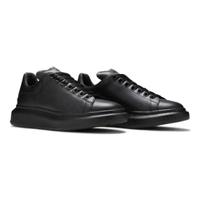 Alexander McQueen Schwarzer Leder Sneaker: Luxus, Komfort & Ikonischer Stil