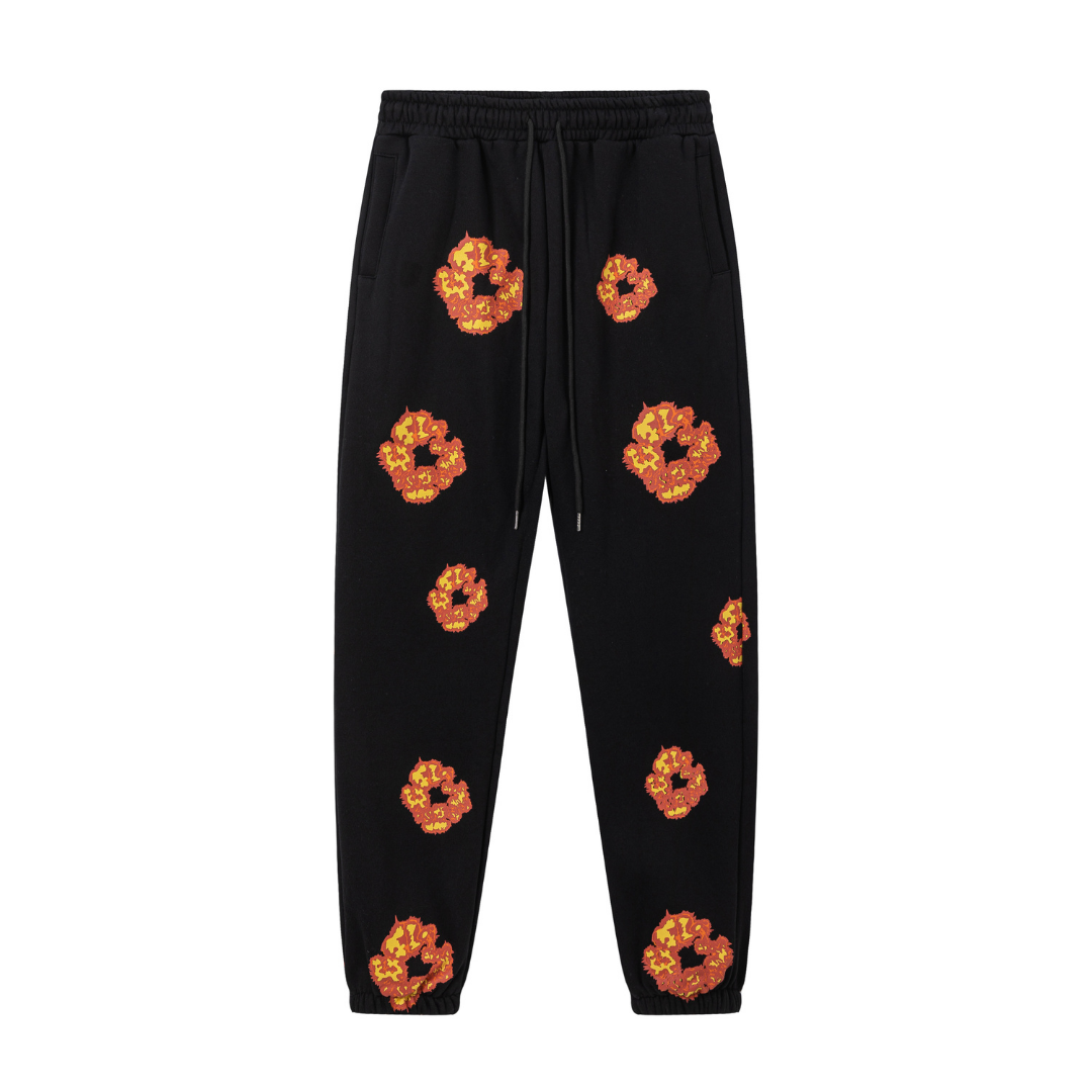 Denim Tears Schwarz Orange Trainingsanzug: Stylisch, Bequem, Exklusiv für Streetwear-Fans