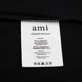 AMI Paris Unisex Herz-Logo T-Shirt: Premium Baumwolle für stilvollen Komfort