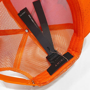 Luxuriöse Amiri Cap Orange-Schwarz mit Logo-Stickerei – Exklusives Streetwear Accessoire
