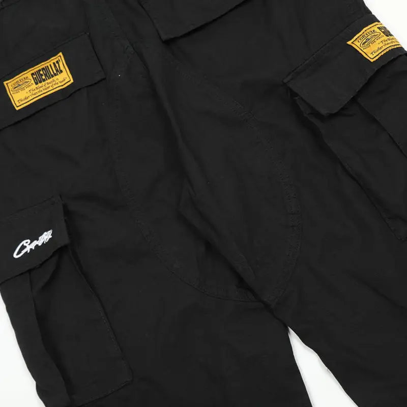 Corteiz Robuste Schwarze Cargo Hose – Lässiger Streetwear Workwear Style mit Taschen