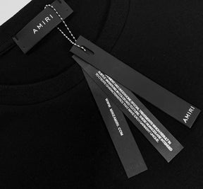 Luxuriöses Amiri Paint Drip T-Shirt: Künstlerischer Streetwear-Stil für Herren