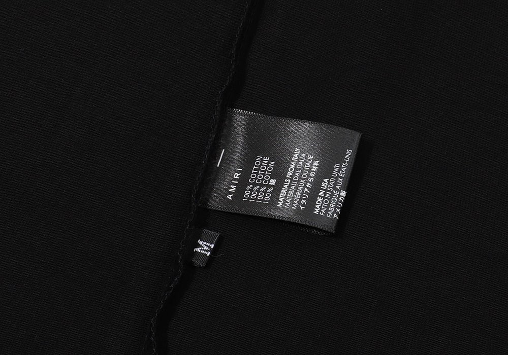 Amiri Militär Schwarz Specs Schablonen T-Shirt für Herren – Premium Style