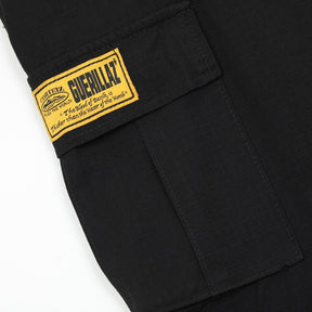 Corteiz Cargo Shorts Schwarz Gelb – Robuste Streetwear für den urbanen Look